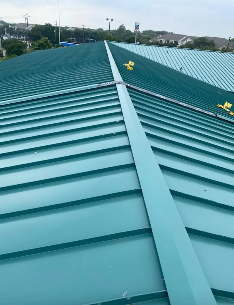 Green commercial metal roof ridge and valley for Metal Roof Repair in Cairo